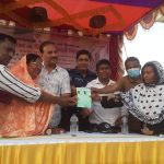 লাঙ্গলঝাড়ায় বঙ্গবন্ধুর জন্মবার্ষিকীতে টিসিবি কার্ড বিতরণ