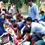দিনাজপুরে মা দিবসে মায়েদের পা ধোয়ার আয়োজন