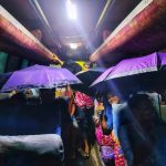 বৃষ্টিতে যবিপ্রবির বাসে পানি পড়া ঠেকাতে একমাত্র সম্বল ছাতা